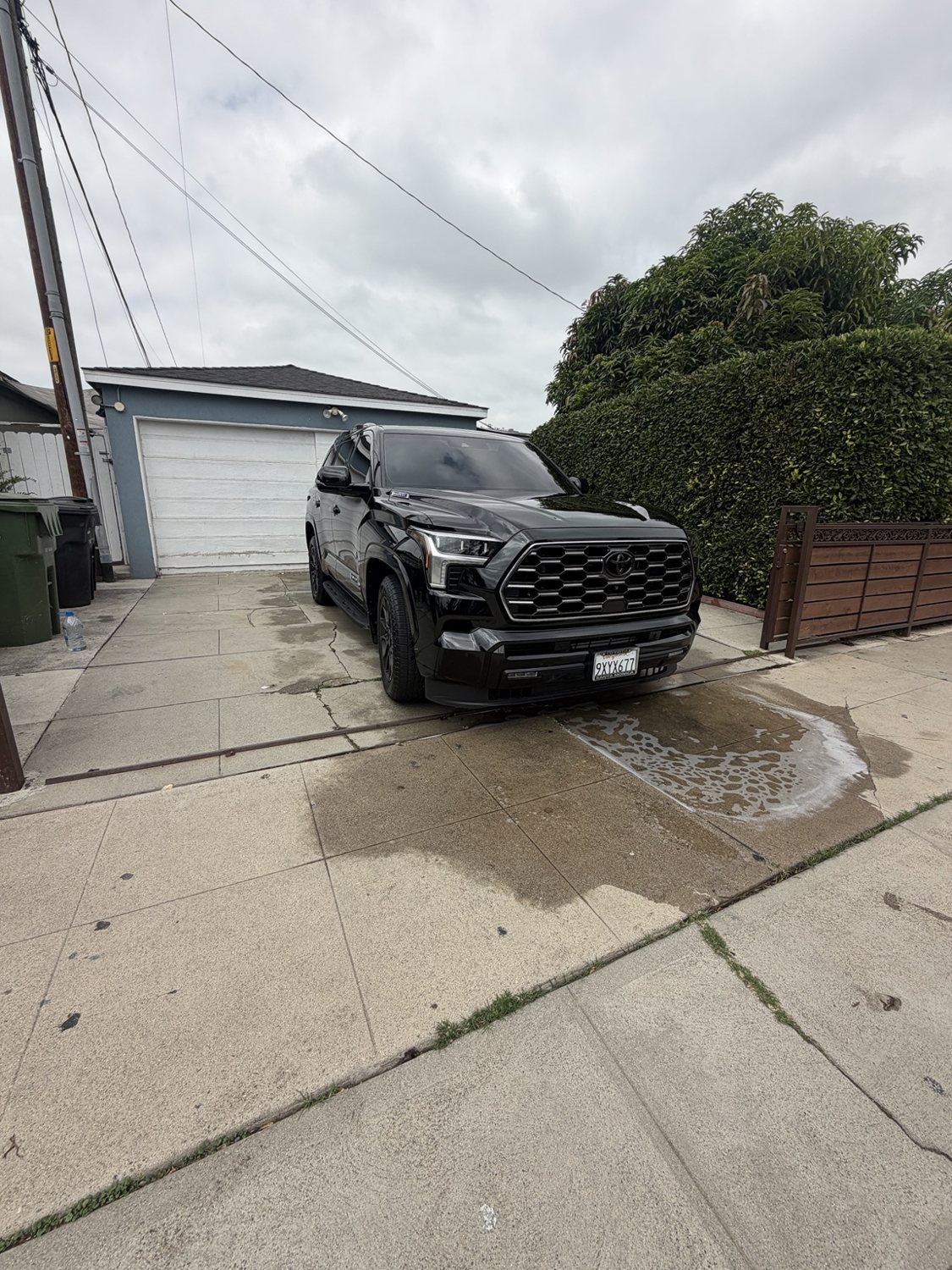 Black Toyota SUV with glossy paint after detailing